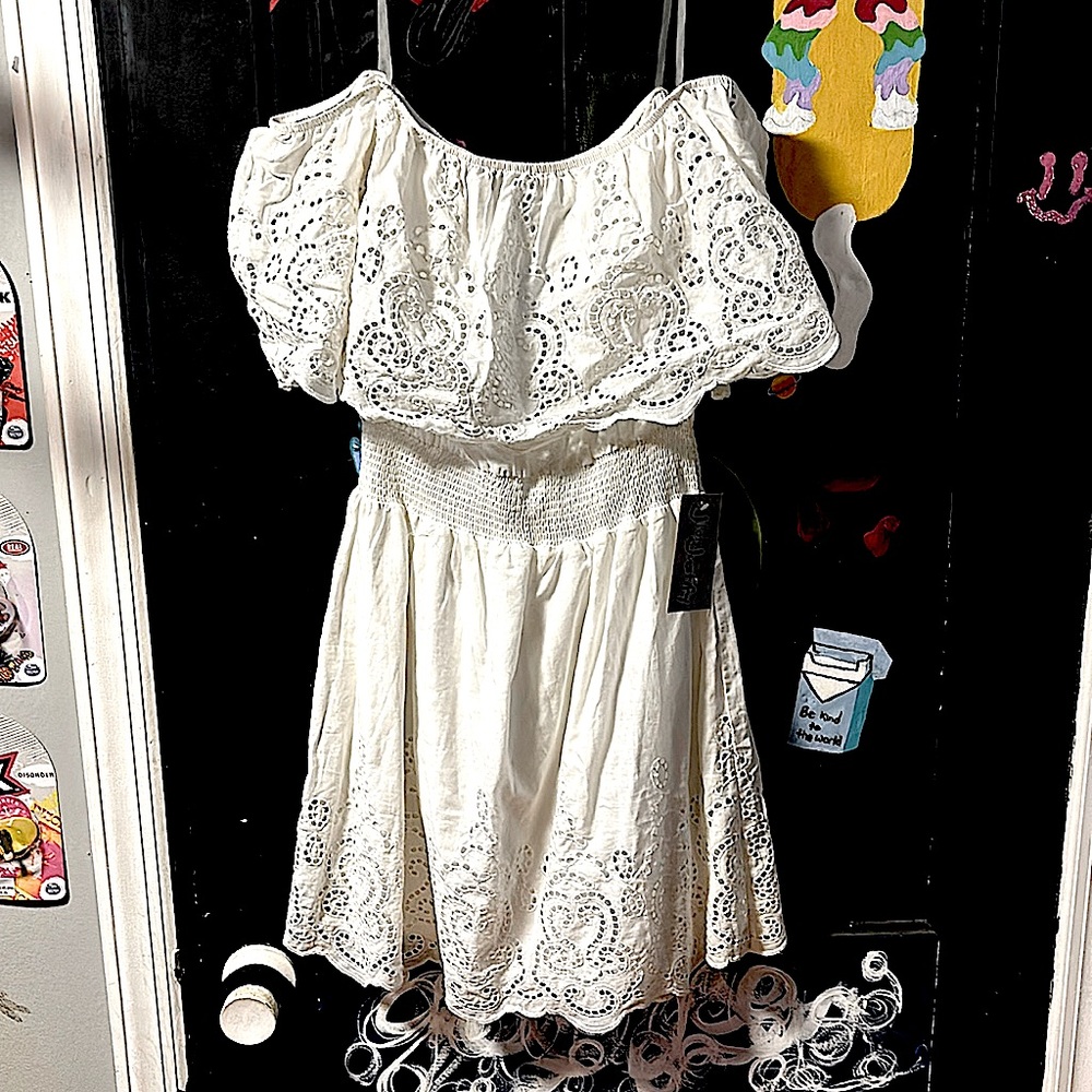 White dress, with tags still on.